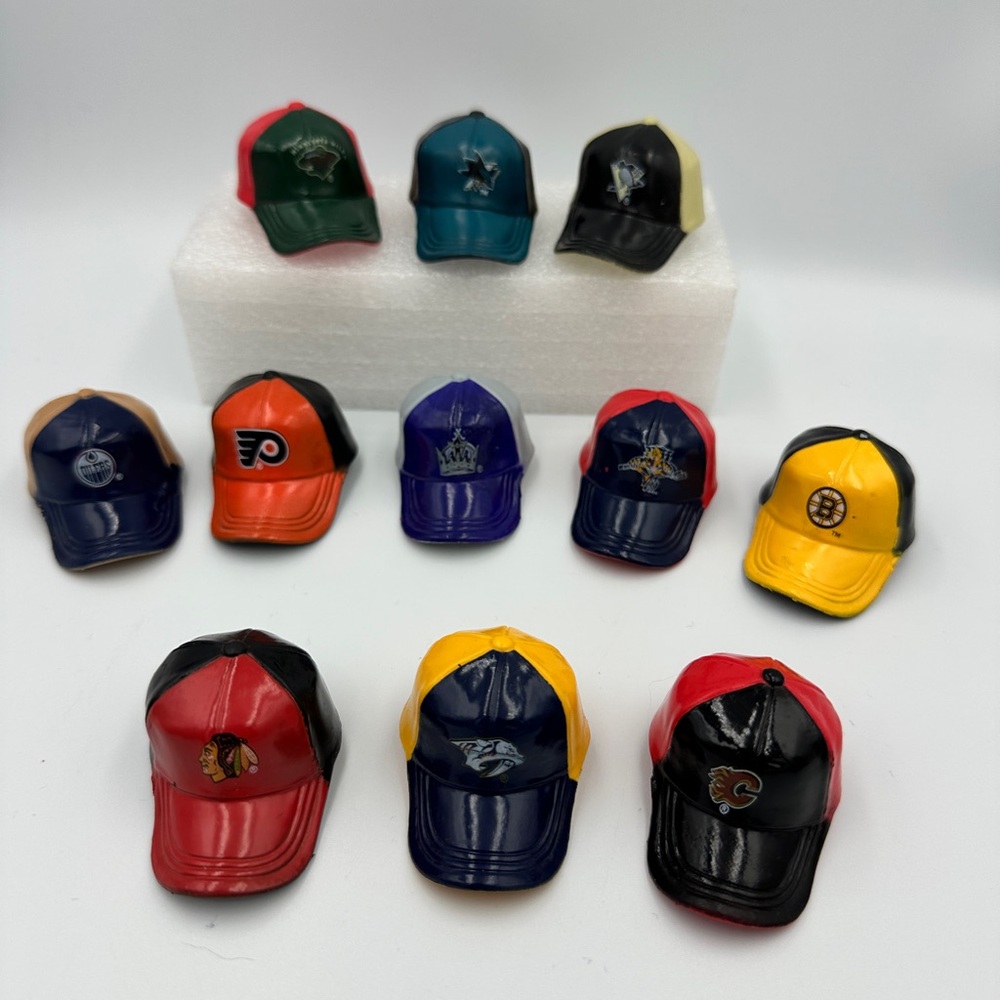 Lot of 11  HOCKEY MINI TEAM CAP HATS  2" LONG NHL LICENSED - Plastic